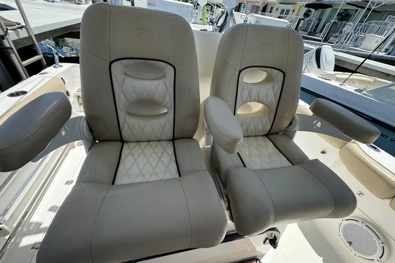 Slide: The Image of Luxurious seating on 2017 Sea Fox 288 Commander boat, featuring plush, ergonomic design. - 9