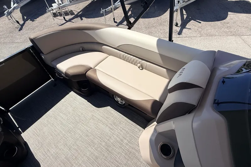 Slide: The Image of 2026 Avalon 2385 LSZ Rear Fish Tri Toon boat interior with plush seating and modern design. - 15