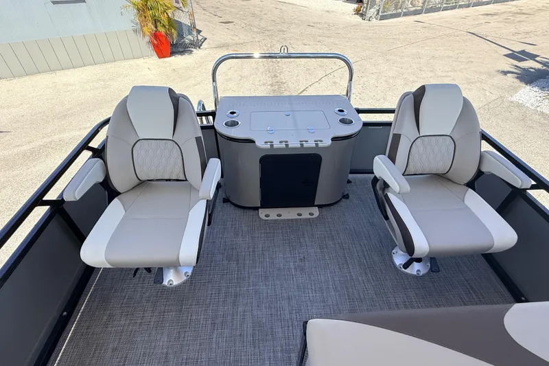 Slide: The Image of 2026 Avalon 2385 LSZ Rear Fish Tri Toon boat with dual swivel seats and console. - 19