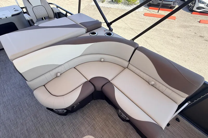 Slide: The Image of Luxurious seating on 2026 Avalon 2385 LSZ Rear Fish Tri Toon boat, featuring high-performance design. - 25