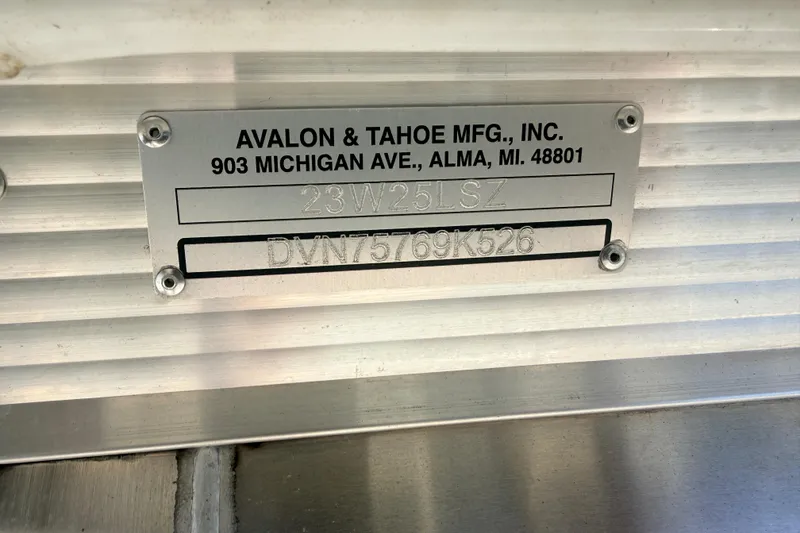 Slide: The Image of Metal identification plate for Avalon 2385 LSZ Rear Fish, Tri Toon, 2026 model. - 27