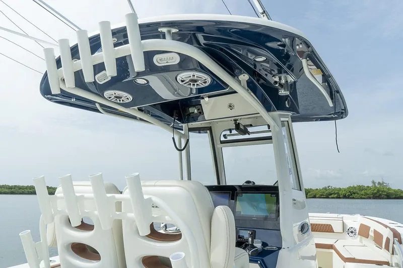 Slide: The Image of Manufacturer Provided Image: 2025 Cobia 285 Center Console boat interior with advanced navigation system. - 11