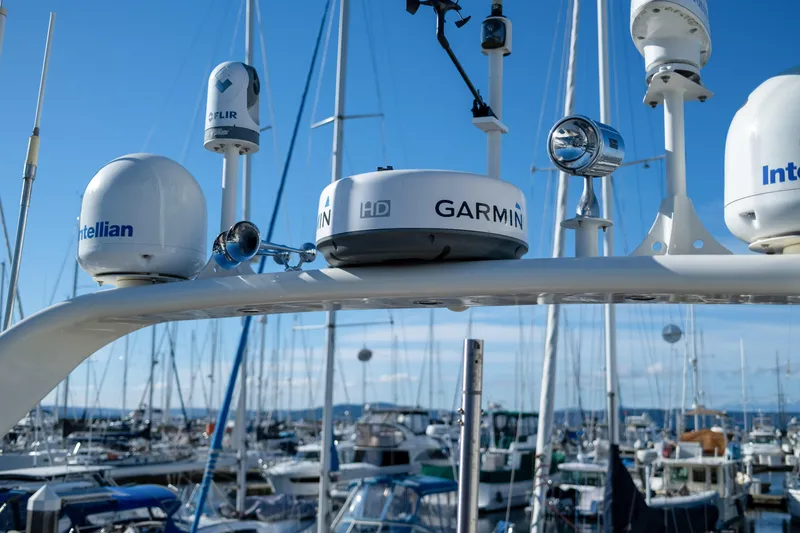 Slide: The Image of Radar and communication equipment on a 2013 Coastal Craft 45 yacht in a marina. - 16