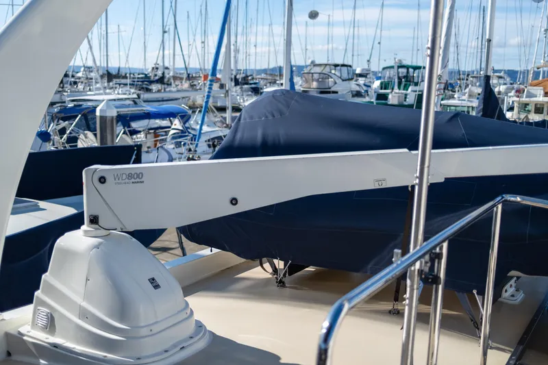Slide: The Image of 2013 Coastal Craft 45 yacht with WD800 Steelhead Marine crane at marina. - 17