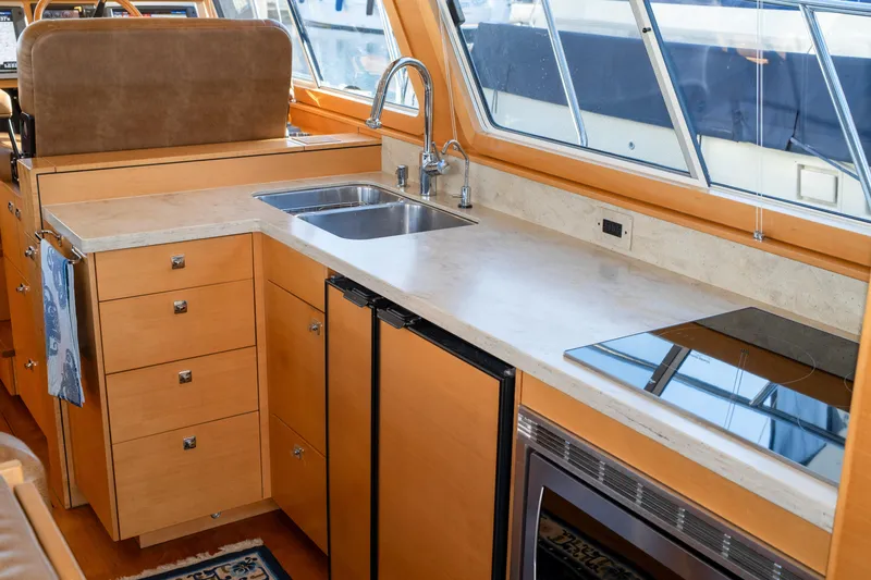 Slide: The Image of Luxurious 2013 Coastal Craft 45 yacht kitchen with modern appliances and sleek design. - 26