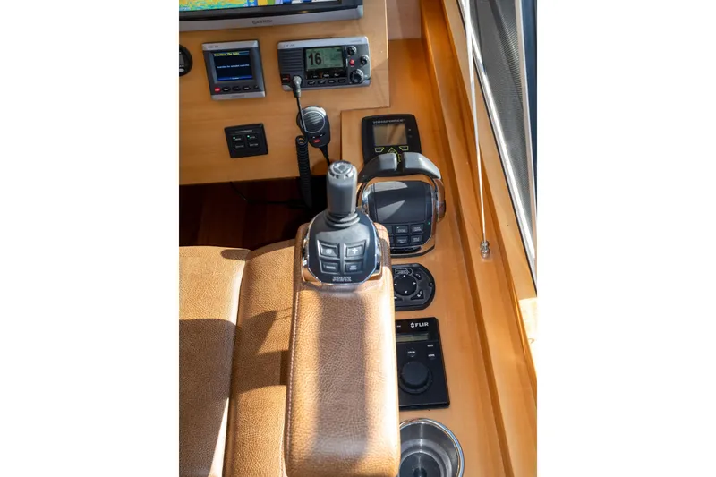 Slide: The Image of Control panel of a 2013 Coastal Craft 45 yacht with navigation equipment. - 31