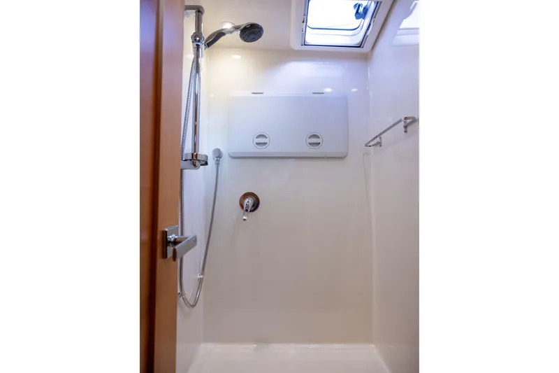 Slide: The Image of Shower area in 2013 Coastal Craft 45 yacht, featuring modern fixtures and natural light. - 35