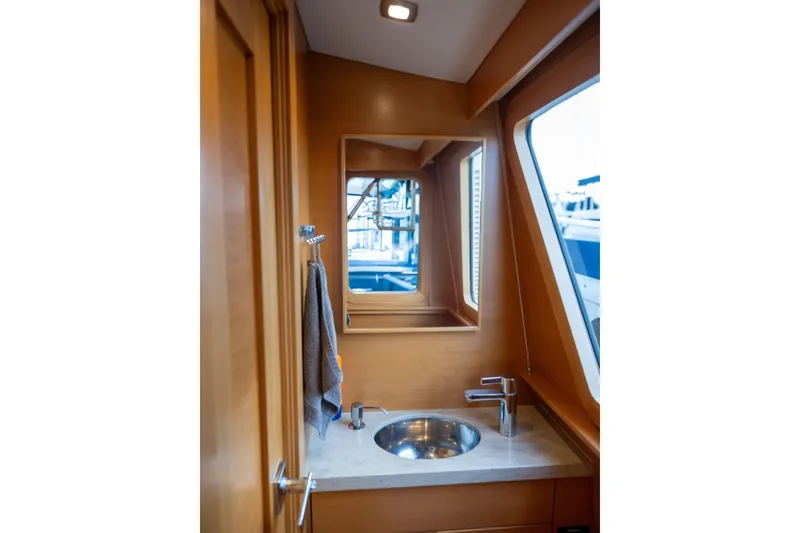 Slide: The Image of Luxurious bathroom interior of 2013 Coastal Craft 45 yacht with modern sink and mirror. - 37