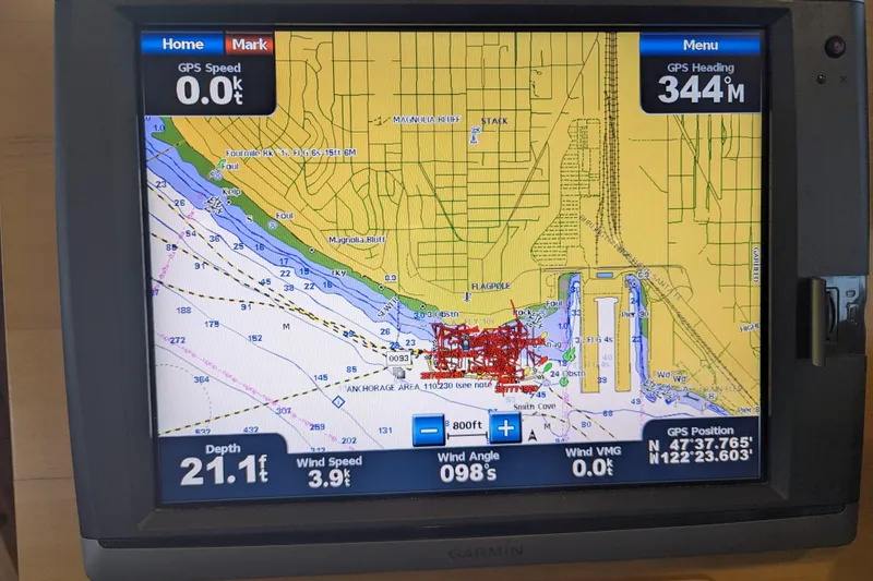 Slide: The Image of Garmin GPS display on 2013 Coastal Craft 45, showing nautical map and navigation data. - 40