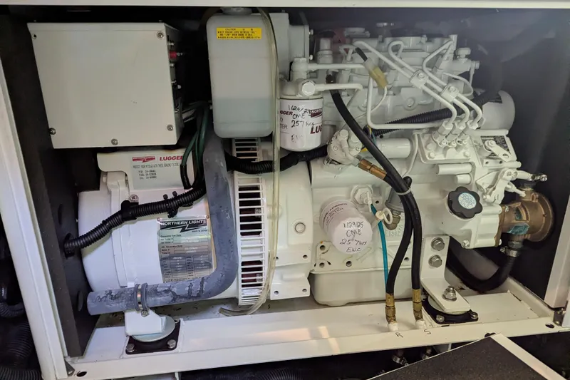 Slide: The Image of Engine compartment of a 2013 Coastal Craft 45 boat, featuring Northern Lights generator. - 41