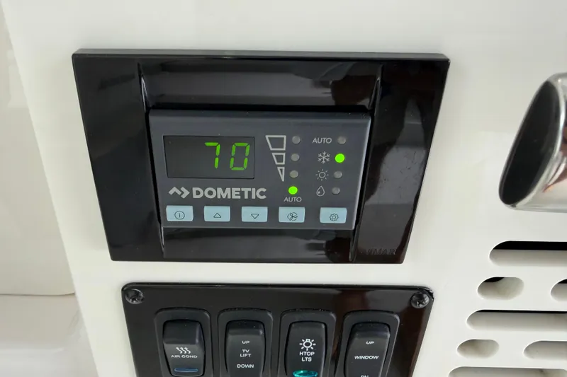 Slide: The Image of Dometic control panel on 2021 Regal 36 XO boat, displaying temperature settings. - 21