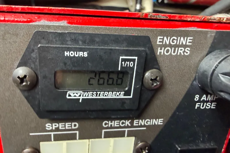 Slide: The Image of Westerbeke engine hour meter showing 266.9 hours on a 2021 Regal 36 XO. - 69