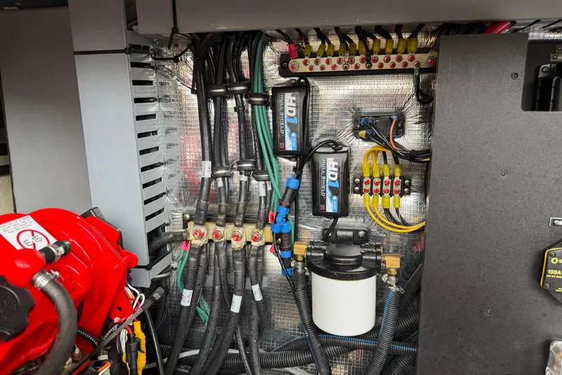 Slide: The Image of Electrical system of 2021 Regal 36 XO boat, featuring wiring and components. - 71