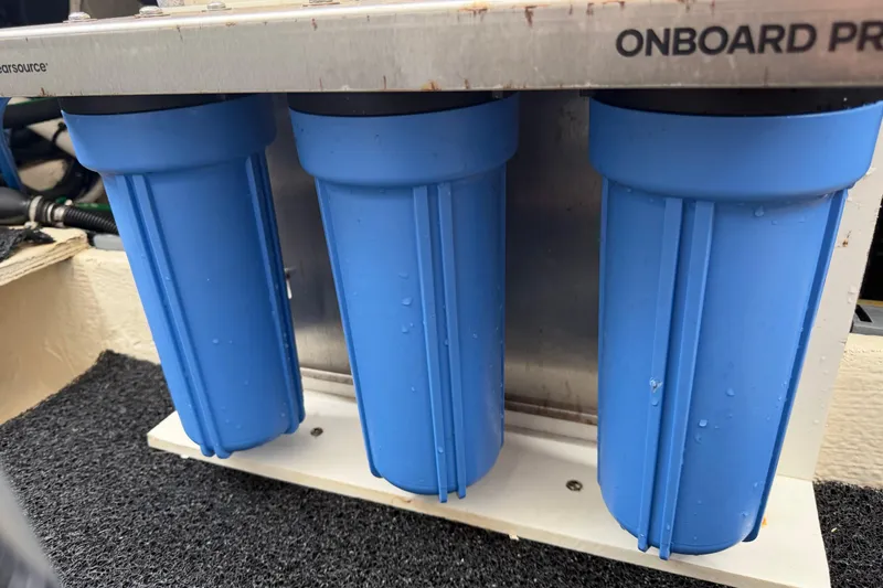 Slide: The Image of Blue water filtration system on a 2021 Regal 36 XO boat. - 72