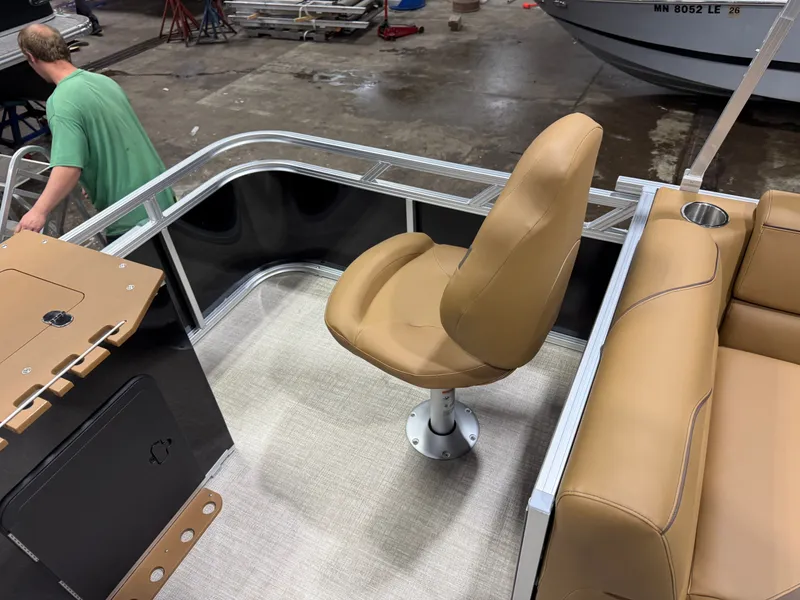 Slide: The Image of Interior of 2026 Tahoe Sport 23E80 pontoon with leather seating. - 18