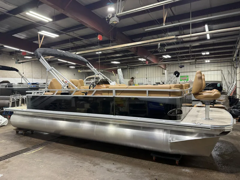 Slide: The Image of 2026 Tahoe Sport 23E80 pontoon boat in a workshop. - 43