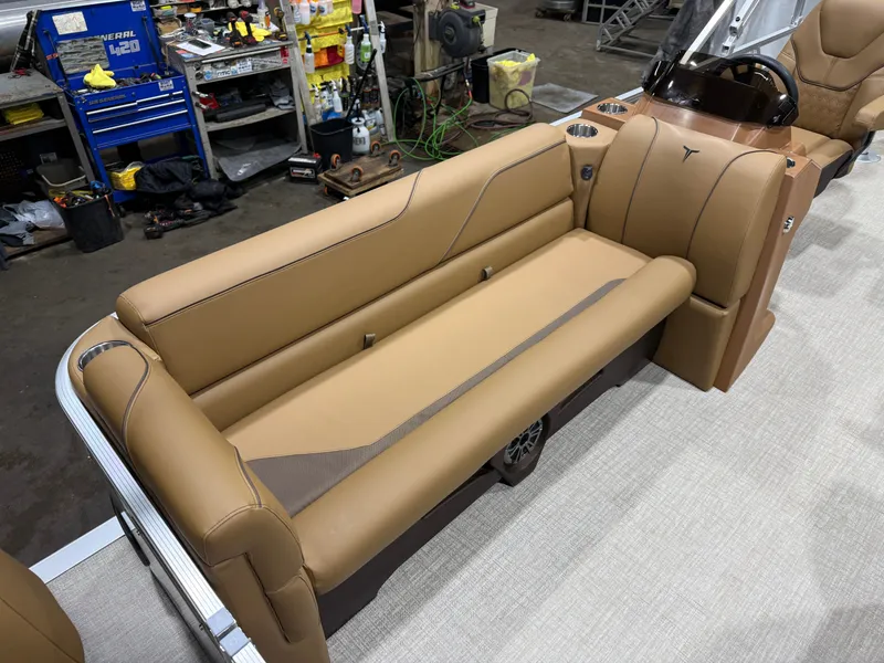 Slide: The Image of Interior of Tahoe Sport 23E80 Pontoon, brown leather seats, 2026 model. - 8