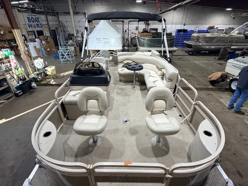 Slide: The Image of 2008 Sylvan Mirage 8520 Party Fish pontoon boat indoors. - 10