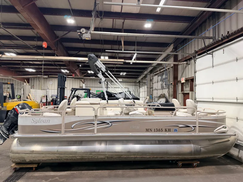 Slide: The Image of 2008 Sylvan Mirage 8520 Party Fish pontoon boat in warehouse. - 20