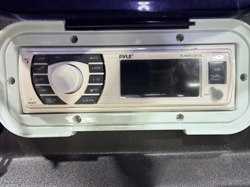 Slide: The Image of Pyle PLRMR23BTW radio on 2008 Sylvan Mirage 8520 Party Fish. - 26