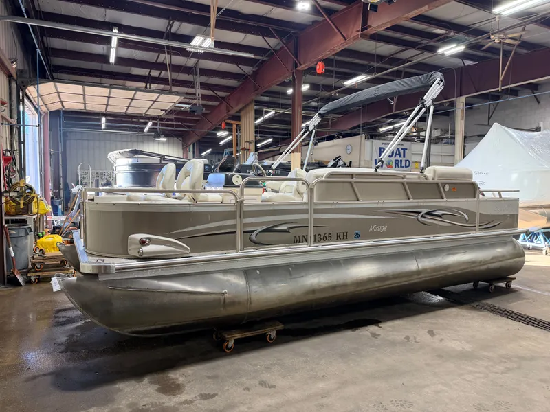 Slide: The Image of 2008 Sylvan Mirage 8520 Party Fish pontoon boat in warehouse. - 27