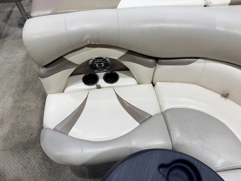 Slide: The Image of Sylvan Mirage 8520 Party Fish 2008 seating area with cup holders. - 31