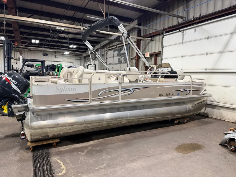 Slide: The Image of 2008 Sylvan Mirage 8520 Party Fish pontoon boat in warehouse. - 44