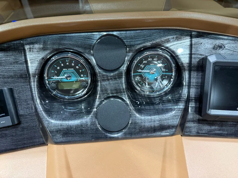 Slide: The Image of Dashboard of 2026 Tahoe LTZ 2385 Elite Cruise Tritoon. - 13