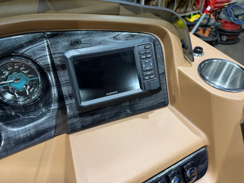 Slide: The Image of 2026 Tahoe LTZ 2385 Elite Cruise dashboard with Garmin GPS. - 14