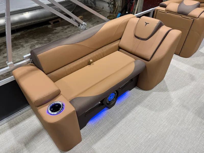 Slide: The Image of Luxurious seating in Tahoe LTZ 2385 Elite Cruise Tritoon, 2026 model. - 18