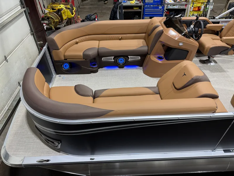 Slide: The Image of Luxurious interior of the 2026 Tahoe LTZ 2385 Elite Cruise Tritoon. - 2