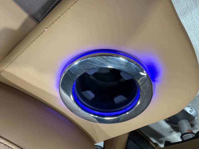 Slide: The Image of Illuminated cup holder in Tahoe LTZ 2385 Elite Cruise Tritoon, 2026 model. - 23