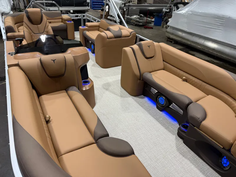 Slide: The Image of Luxurious interior of the 2026 Tahoe LTZ 2385 Elite Cruise Tritoon. - 32