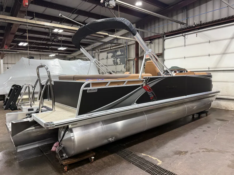 Slide: The Image of 2026 Tahoe LTZ 2385 Elite Cruise Tritoon in warehouse. - 43