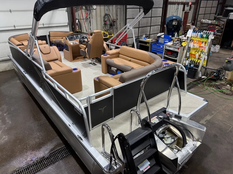 Slide: The Image of 2026 Tahoe LTZ 2385 Elite Cruise Tritoon in workshop. - 45