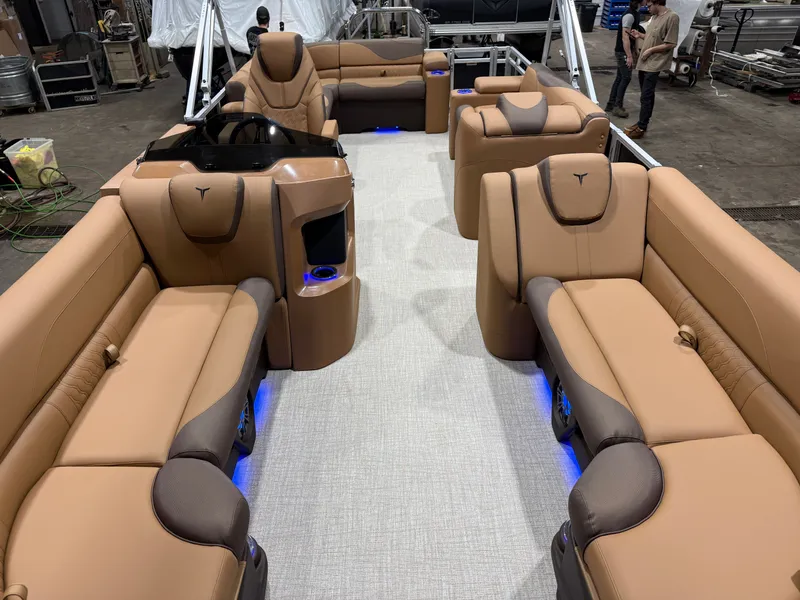 Slide: The Image of Luxurious interior of the 2026 Tahoe LTZ 2385 Elite Cruise Tritoon. - 6