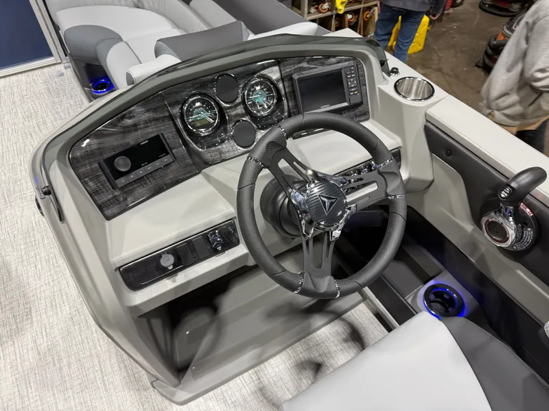 Slide: The Image of Interior view of 2026 Tahoe LTZ 2385 Swingback Tritoon cockpit. - 11