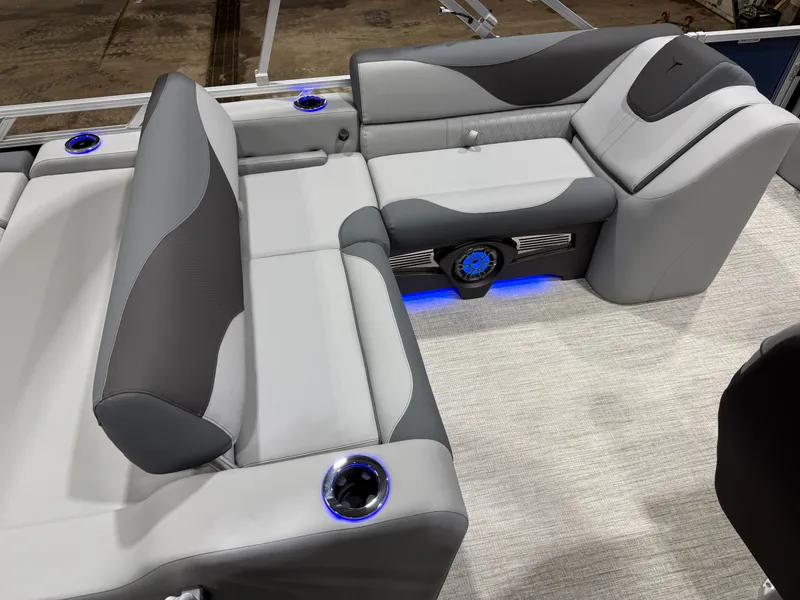 Slide: The Image of Interior of 2026 Tahoe LTZ 2385 Swingback Tritoon with gray seating. - 17
