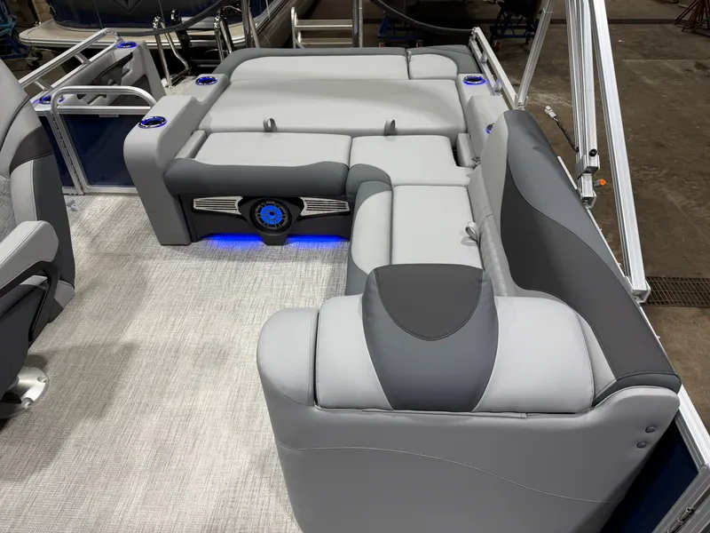 Slide: The Image of Interior of 2026 Tahoe LTZ 2385 Swingback Tritoon with gray upholstery. - 18