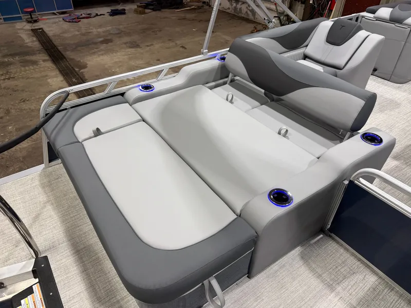 Slide: The Image of 2026 Tahoe LTZ 2385 Tritoon with gray cushioned seating. - 20
