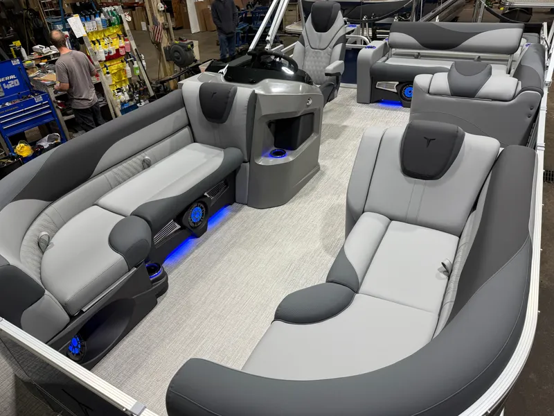Slide: The Image of Interior of 2026 Tahoe LTZ 2385 Swingback Tritoon with luxurious seating. - 37