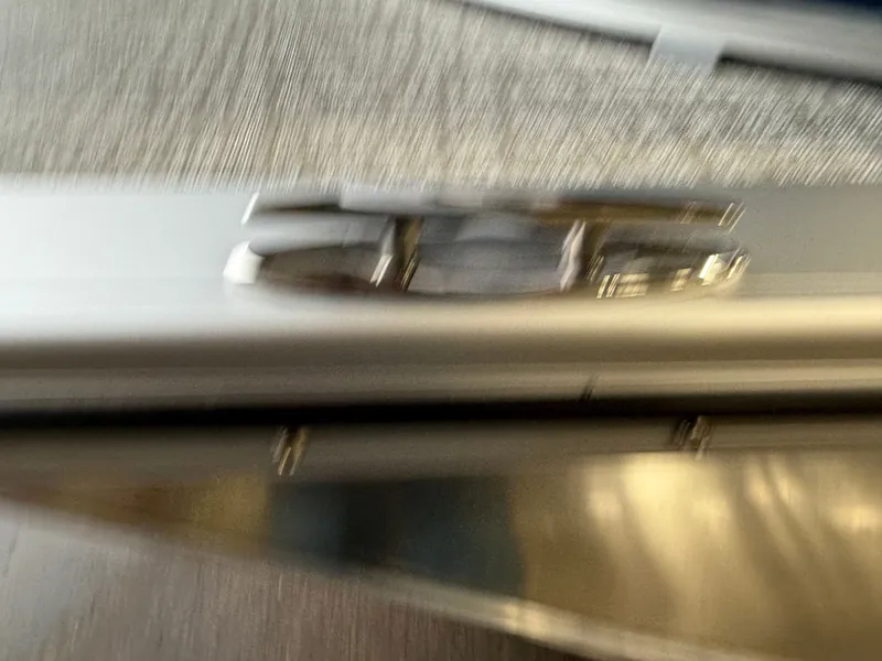 Slide: The Image of Blurred close-up of 2026 Tahoe LTZ 2385 Swingback Tritoon. - 40