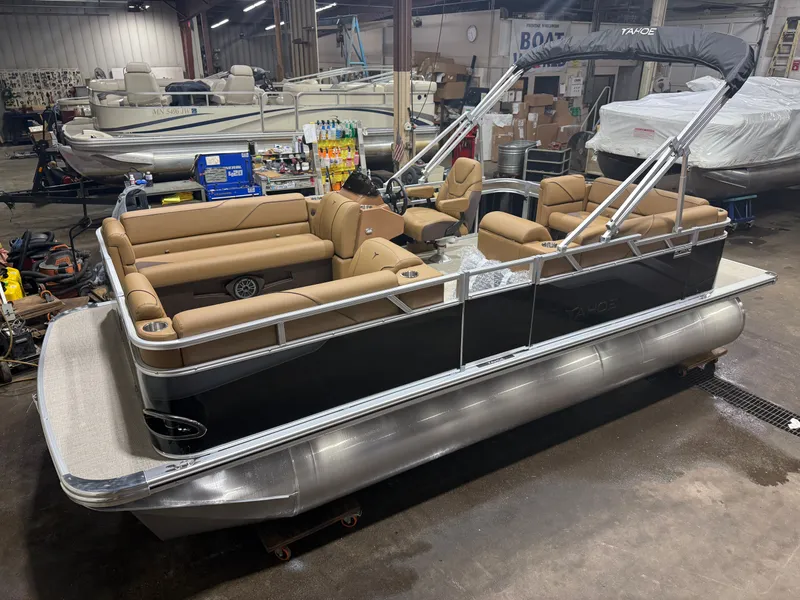 The Image of 2026 Tahoe Sport 1980 pontoon boat in a workshop. - 1