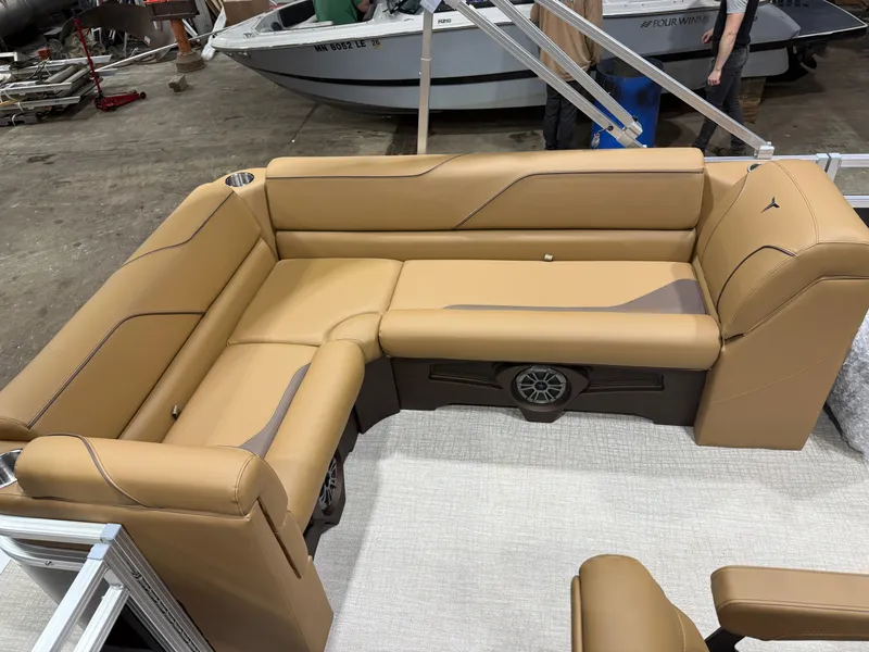 Slide: The Image of Luxurious leather seating in Tahoe Sport 1980 Cruise boat, 2026 model. - 16
