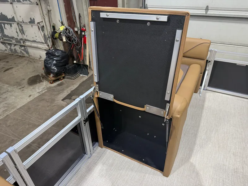 Slide: The Image of Interior of a Tahoe Sport 1980 Cruise boat, seat with storage compartment. - 25