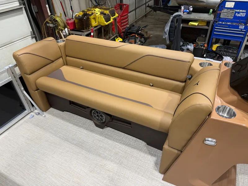 Slide: The Image of Brown leather seating in a 2026 Tahoe Sport 1980 boat. - 30