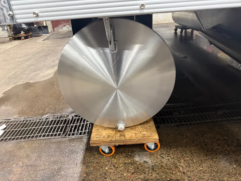 Slide: The Image of Round metal tank on dolly in workshop, Tahoe Sport 1980 Cruise. - 38