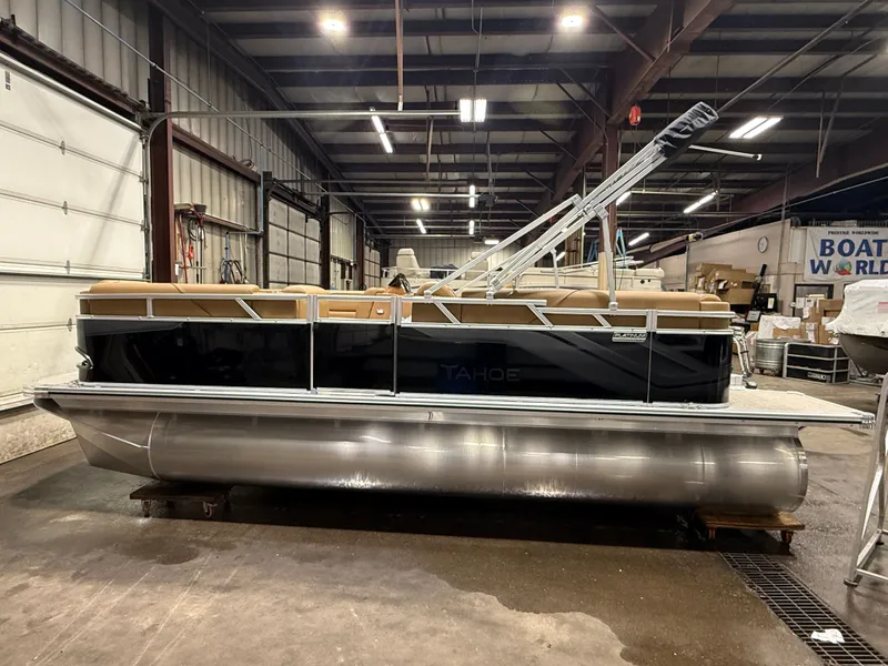 Slide: The Image of 2026 Tahoe Sport 1980 Cruise pontoon boat in warehouse. - 44