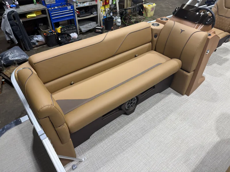 Slide: The Image of Interior of 2026 Tahoe Sport 1980 Cruise boat, brown leather seating. - 7