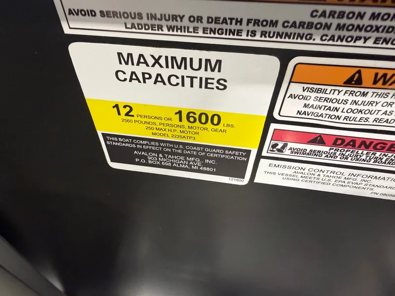 Slide: The Image of Capacity label for 12 persons or 1600 pounds on boat. - 17